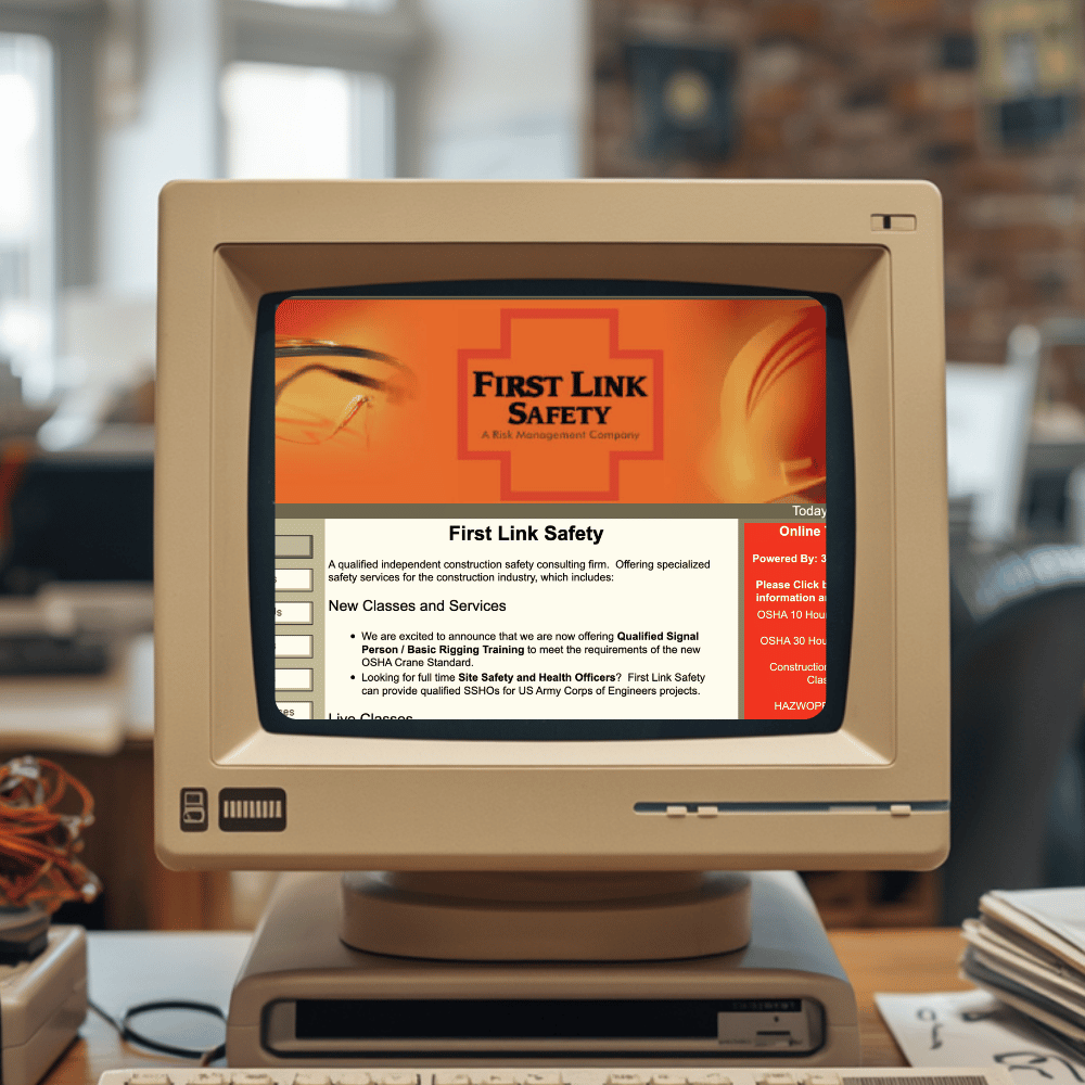 Stylized retro illustration of a vintage CRT monitor on a wooden desk displaying the First Link Safety website.